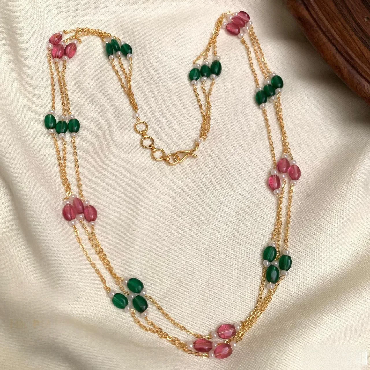 Emerald green with pink